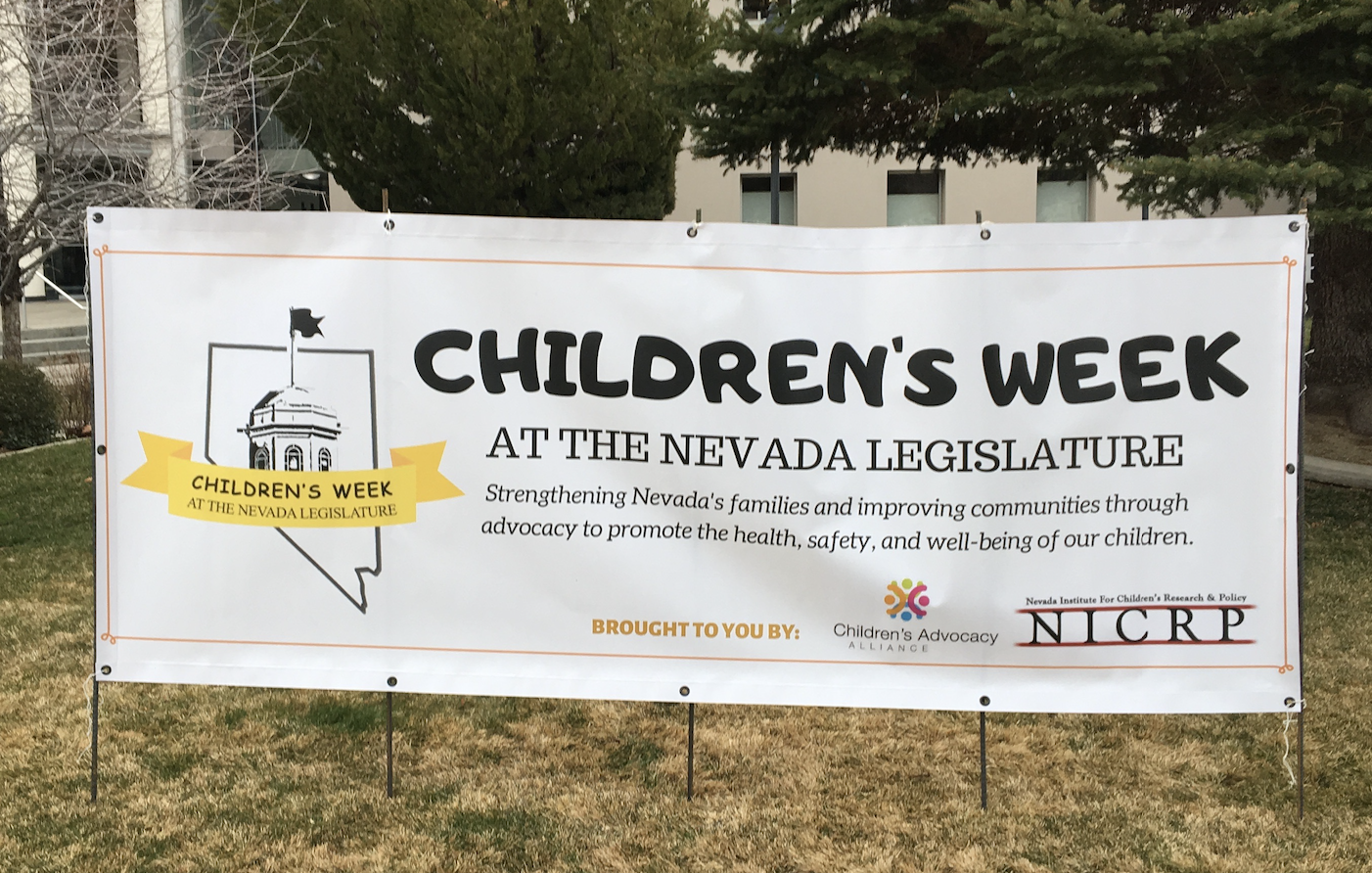 A banner advertising Children's Week at the Nevada Legislation. 